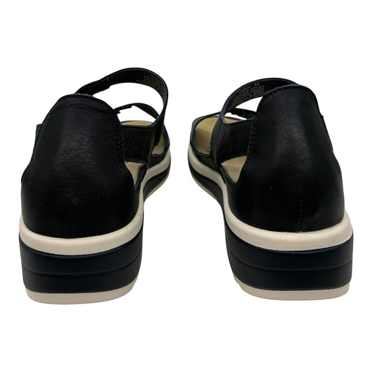 The Shoe Shop Happy navy leather sandals with a supportive white and navy platform sole and secure back strap