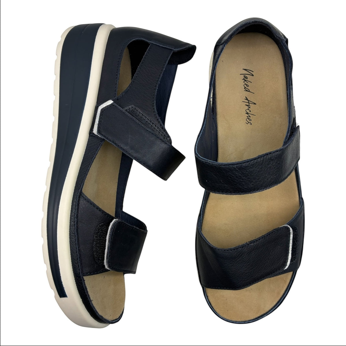 The Shoe Shop Happy navy leather sandals with a supportive white and navy platform sole and secure back strap