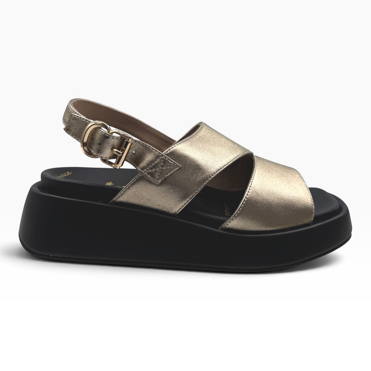 The Shoe Shop Hart metallic gold platform sandal with a black sole and adjustable buckle strap