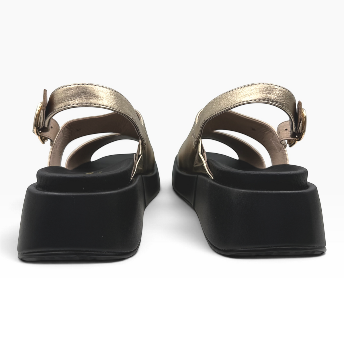 The Shoe Shop Hart metallic gold platform sandals with black chunky soles and adjustable buckle straps