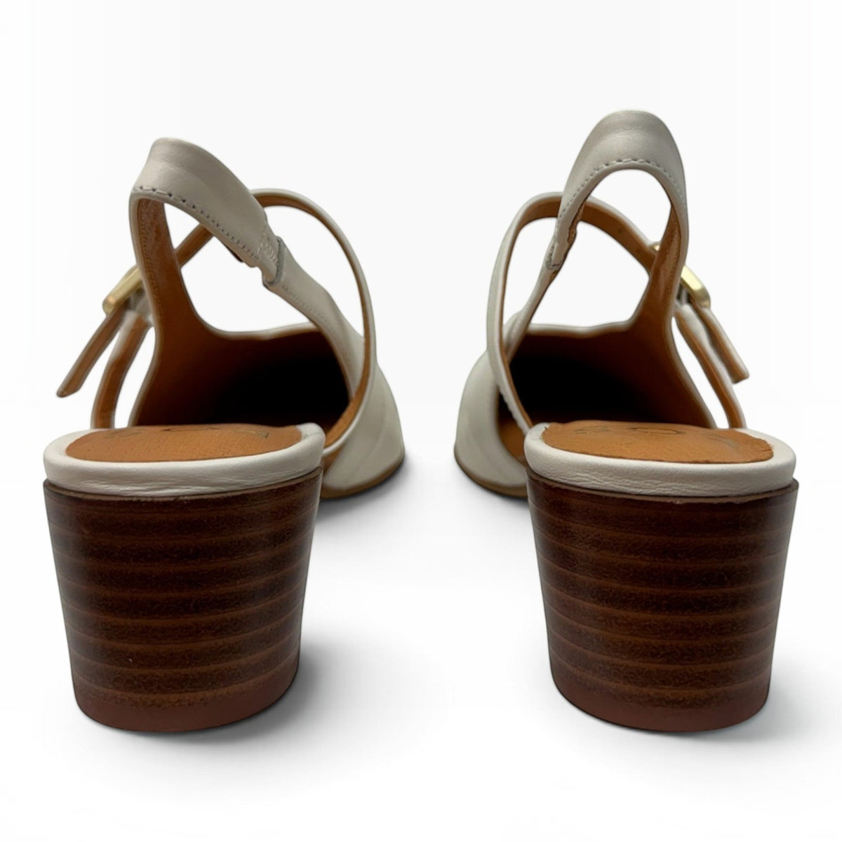 The Shoe Shop Hattis Heel in cream leather with a low stacked block heel and adjustable slingback strap, rear view.
