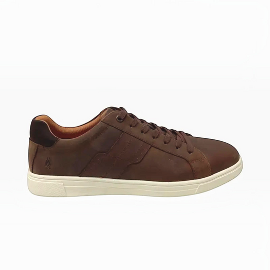 The Shoe Shop Hush Puppies Gravity brown oiled leather sneaker with a white rubber sole and side panel detailing.