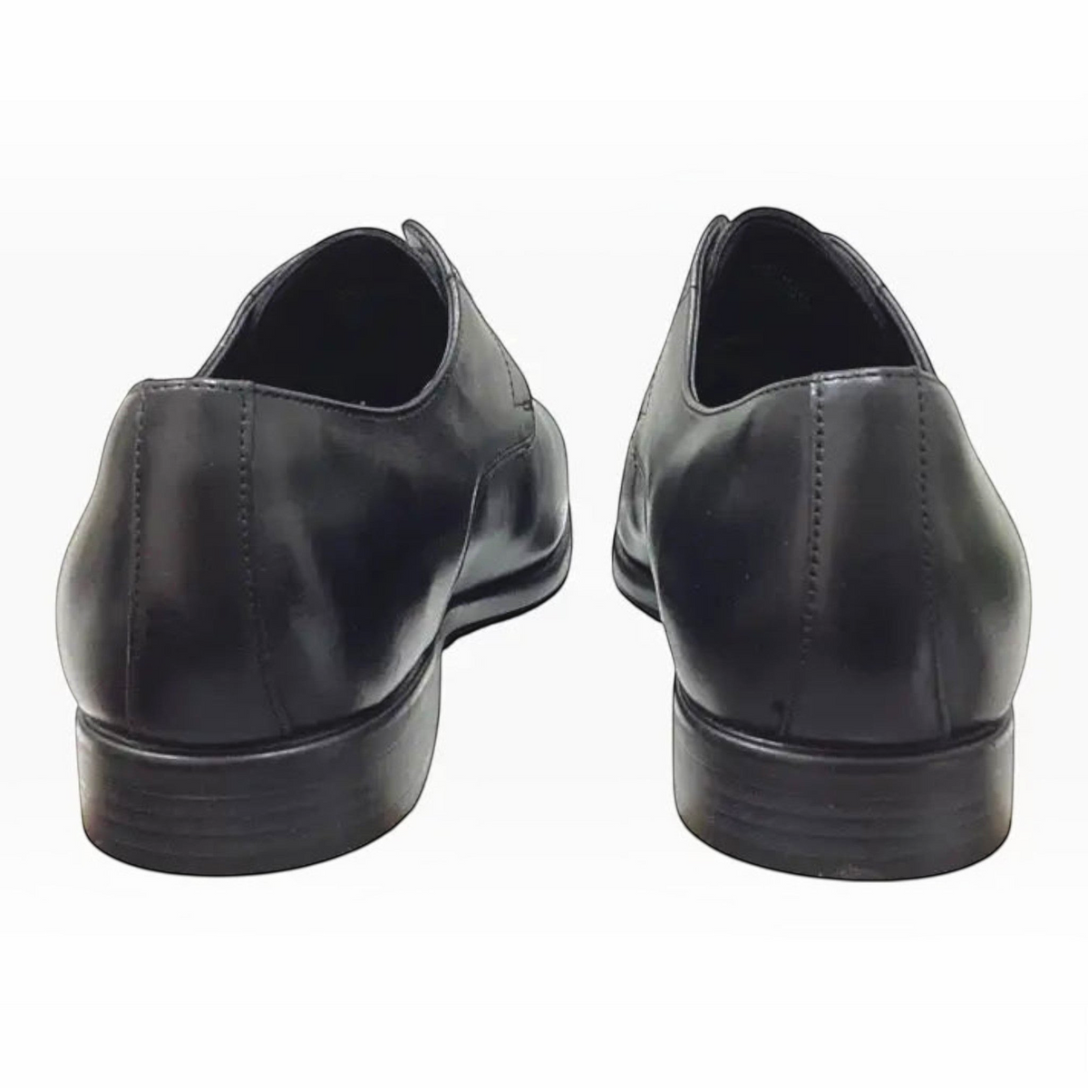 The Shoe Shop Hush Puppies Nero black leather dress shoes viewed from the back showing the heel and smooth finish