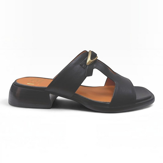 The Shoe Shop Ikami black leather slide sandals with a low block heel and gold-tone metal hardware detail