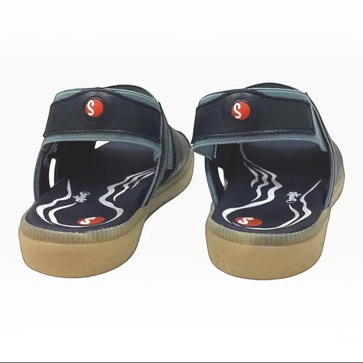 The Shoe Shop Ilix navy leather sling-back sandals with cushioned memory foam footbeds and flexible beige soles.