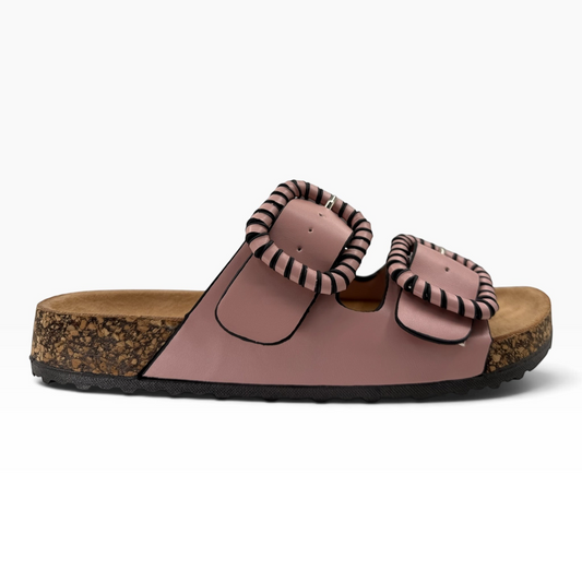 The Shoe Shop Jirona slide in dusty pink leather with two adjustable straps, statement buckles, and cork footbed.