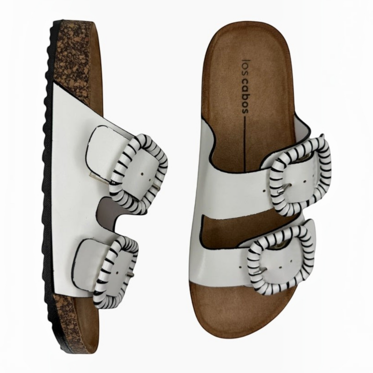 The Shoe Shop Jirona white leather slides featuring two adjustable straps with striped statement buckles and cork soles