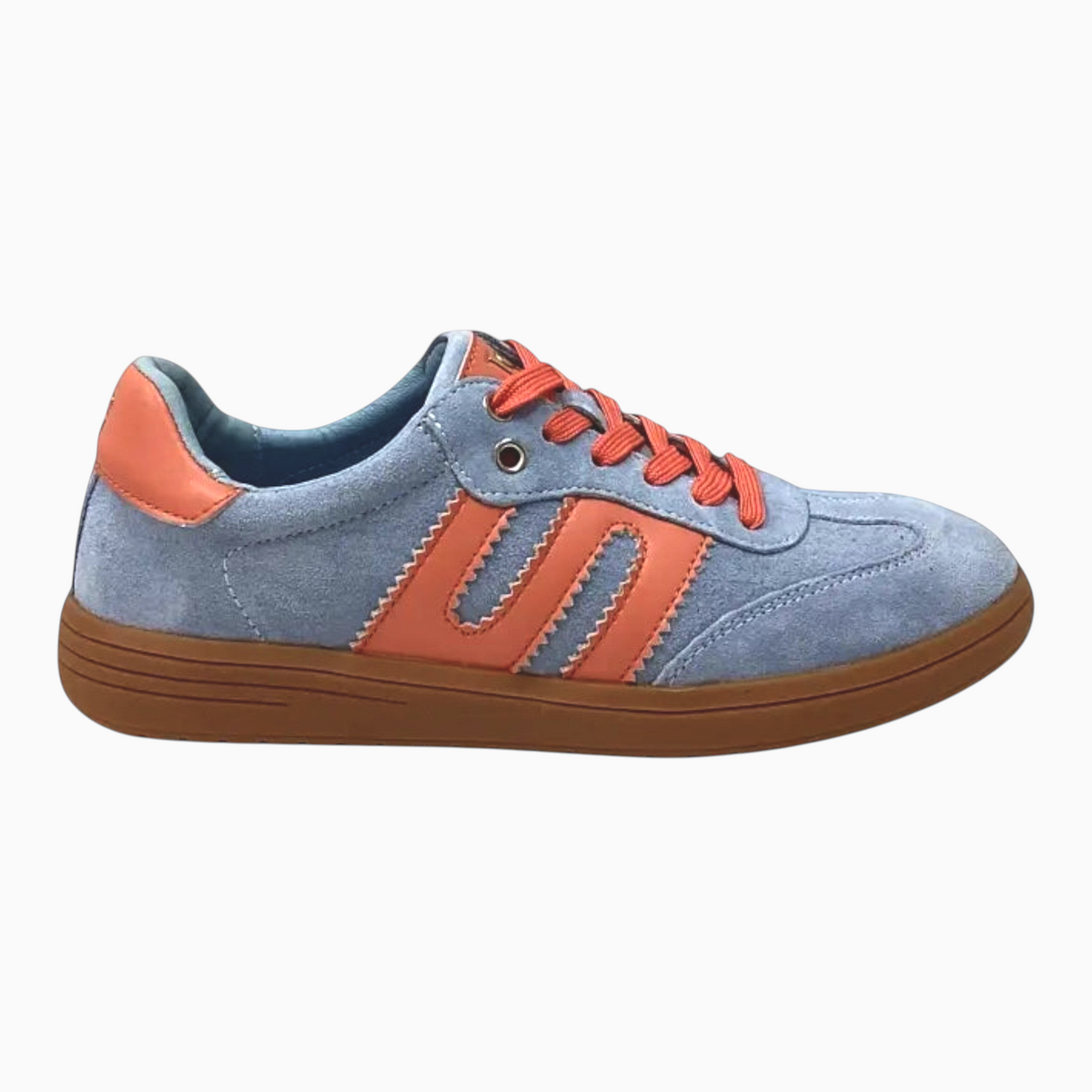 The Shoe Shop Juno sneaker in light blue suede and leather with coral orange accents and a gum rubber outsole.