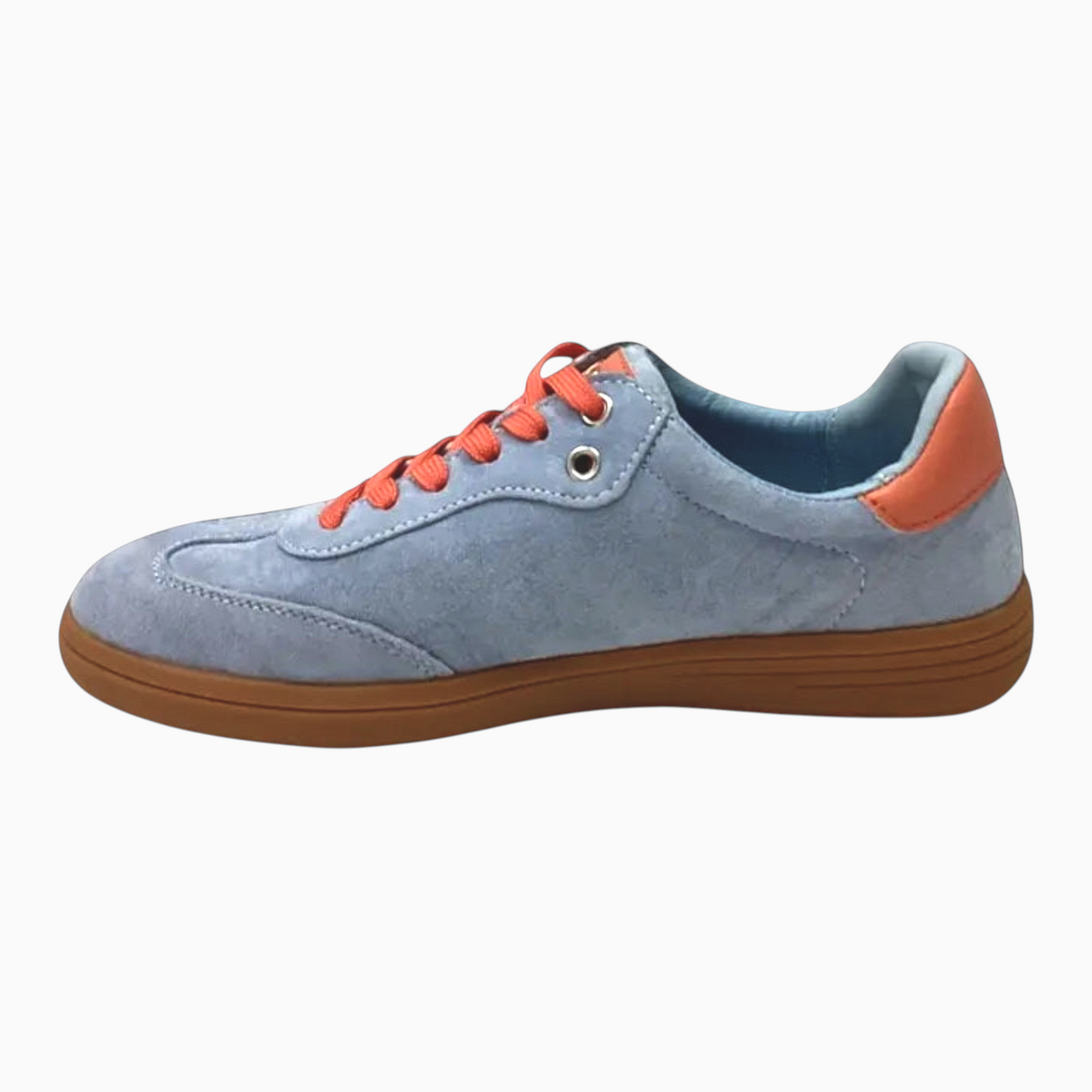 The Shoe Shop Juno sneaker in light blue suede with orange laces and heel tab, featuring a gum rubber outsole.