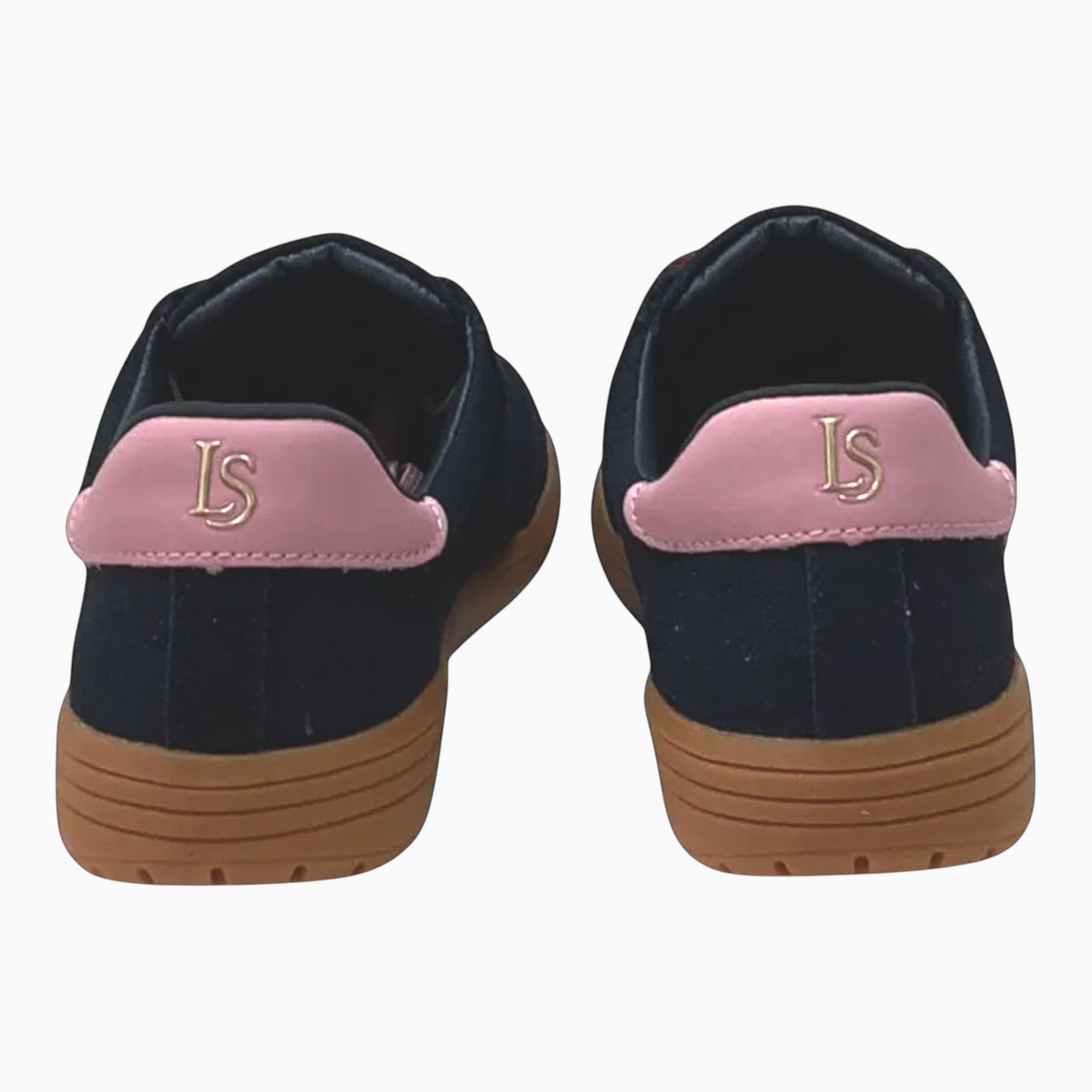 The Shoe Shop Juno sneakers in navy suede with pink heel tabs and gum rubber soles, viewed from the back.