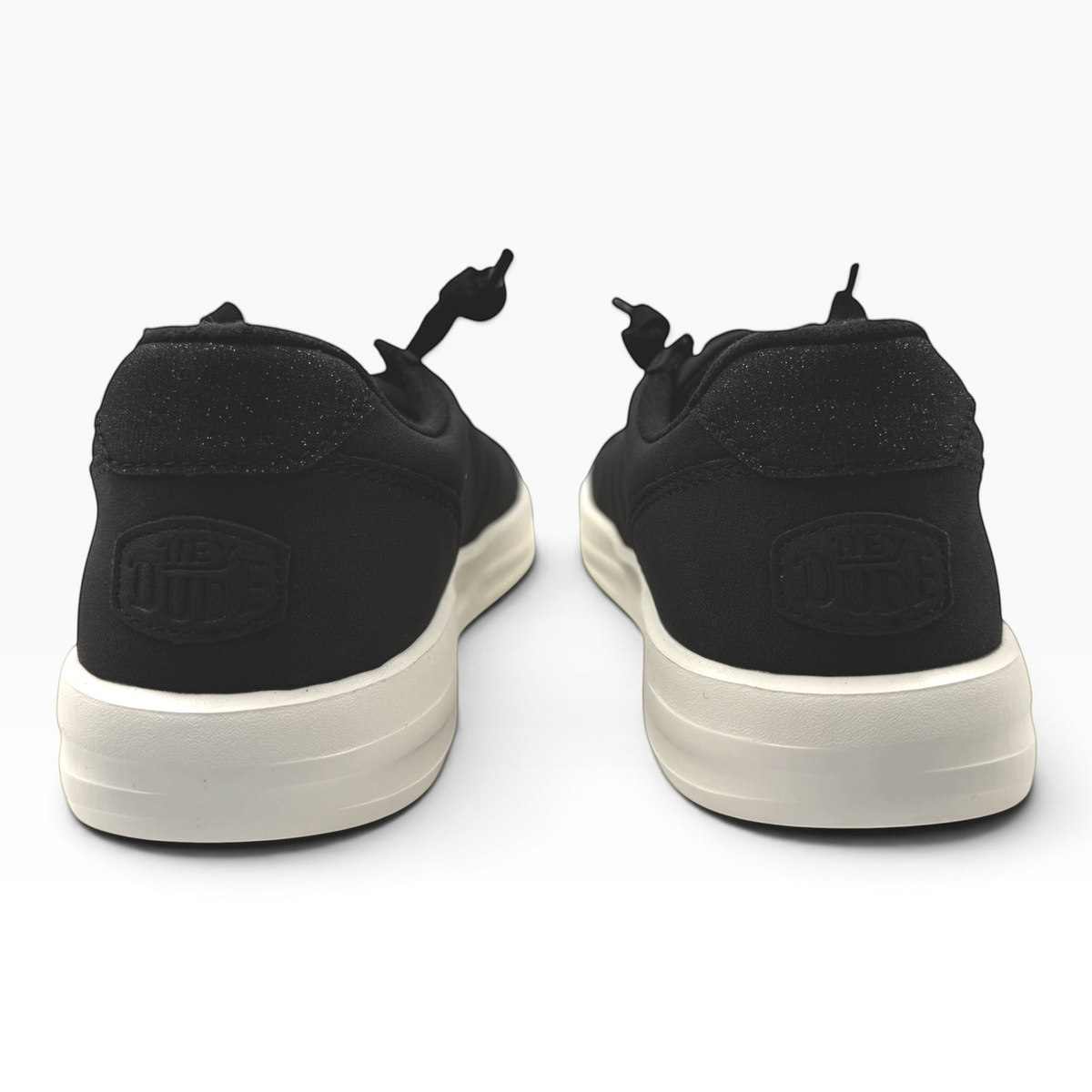 The Shoe Shop Karina Duo Classic black casual sneakers featuring a textured heel patch and a thick beige sole
