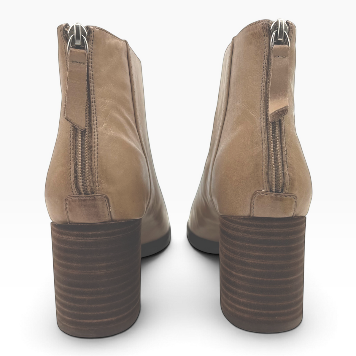 The Shoe Shop Keara ankle boots in tan leather featuring a back zip closure and a stacked block heel, rear view.