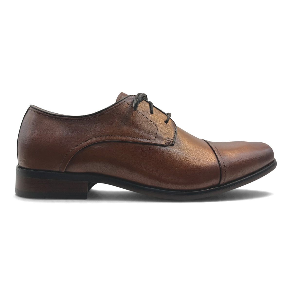 The Shoe Shop Knock cognac brown leather oxford dress shoe with a classic cap toe and lace-up closure