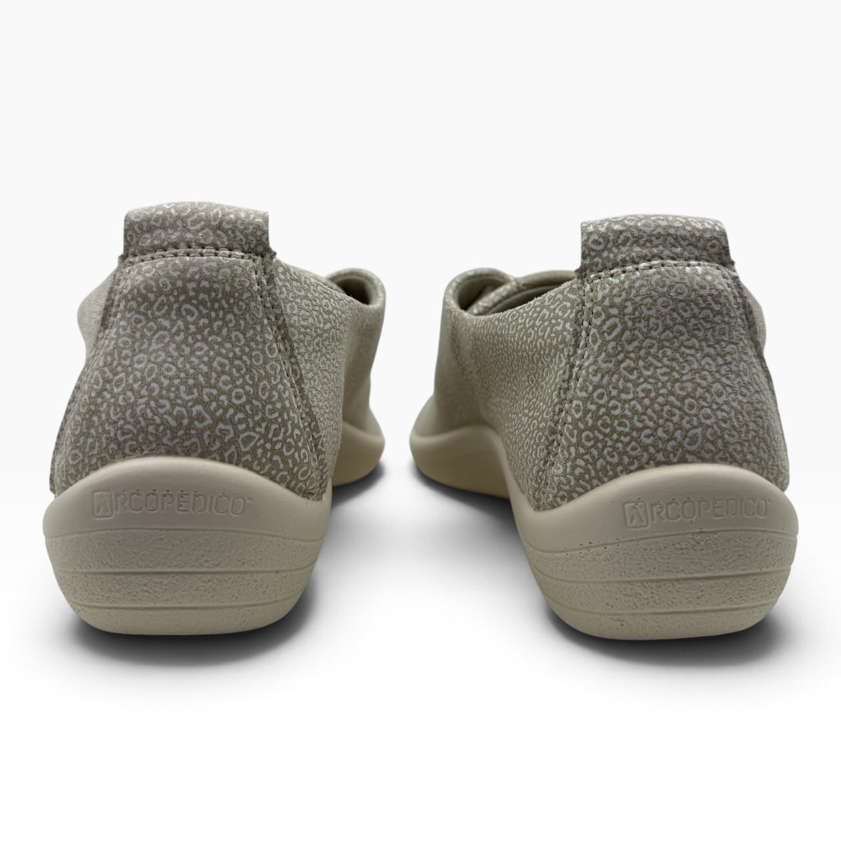 The Shoe Shop Lanin beige leopard print slip-on shoes with cushioned soles viewed from the back.