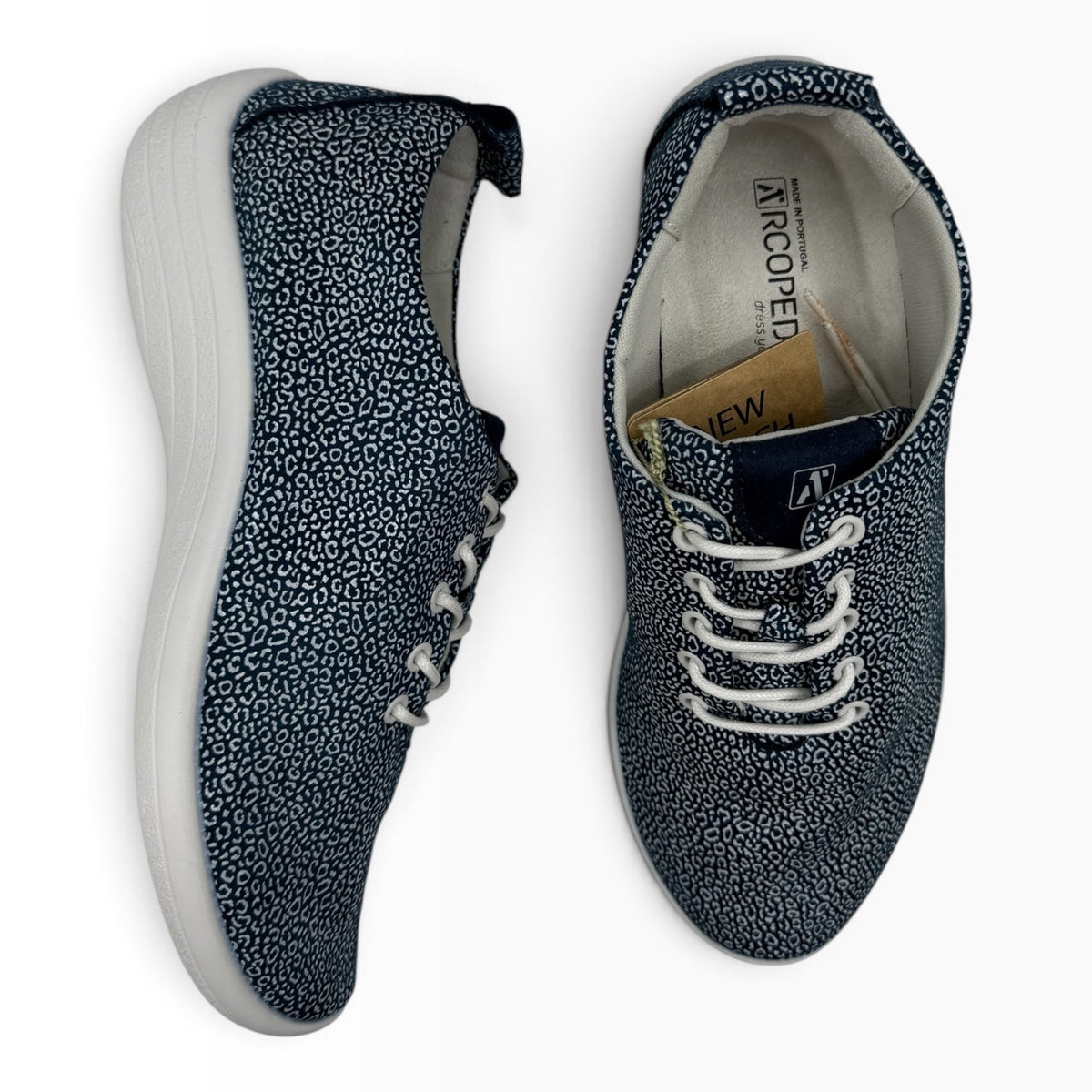 The Shoe Shop Lanin navy blue animal print sneakers with white laces and cushioned white soles