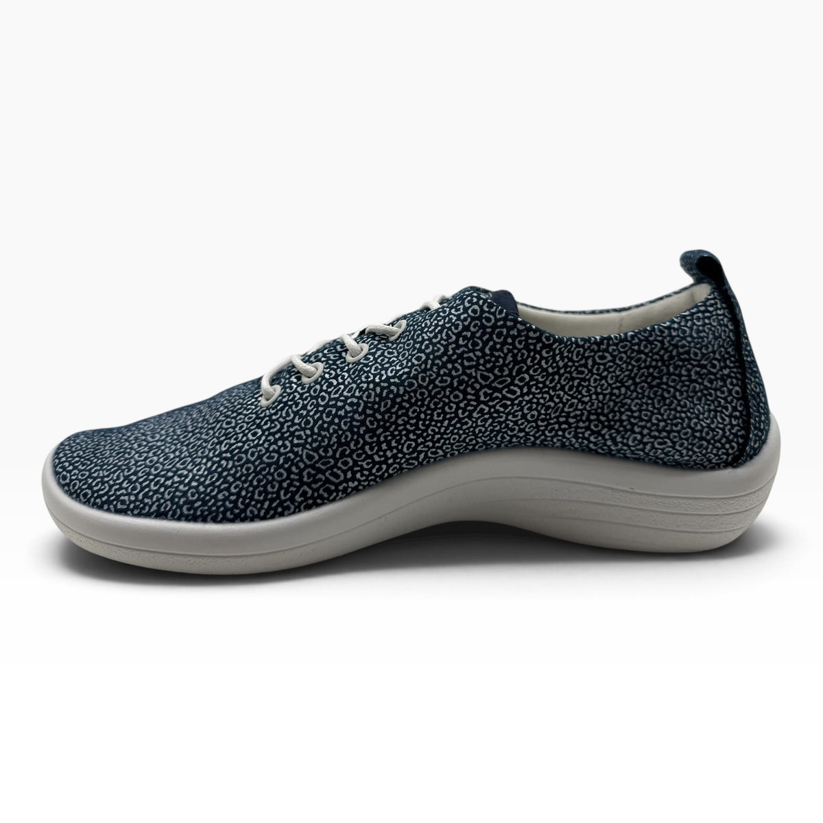 The Shoe Shop Lanin sneaker in navy blue with a white leopard print pattern and a white cushioned sole.