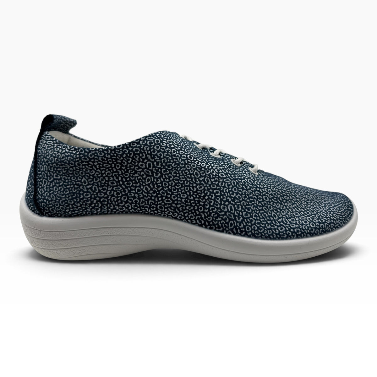 The Shoe Shop Lanin sneaker in navy blue with a white micro-leopard print pattern and a white cushioned sole.