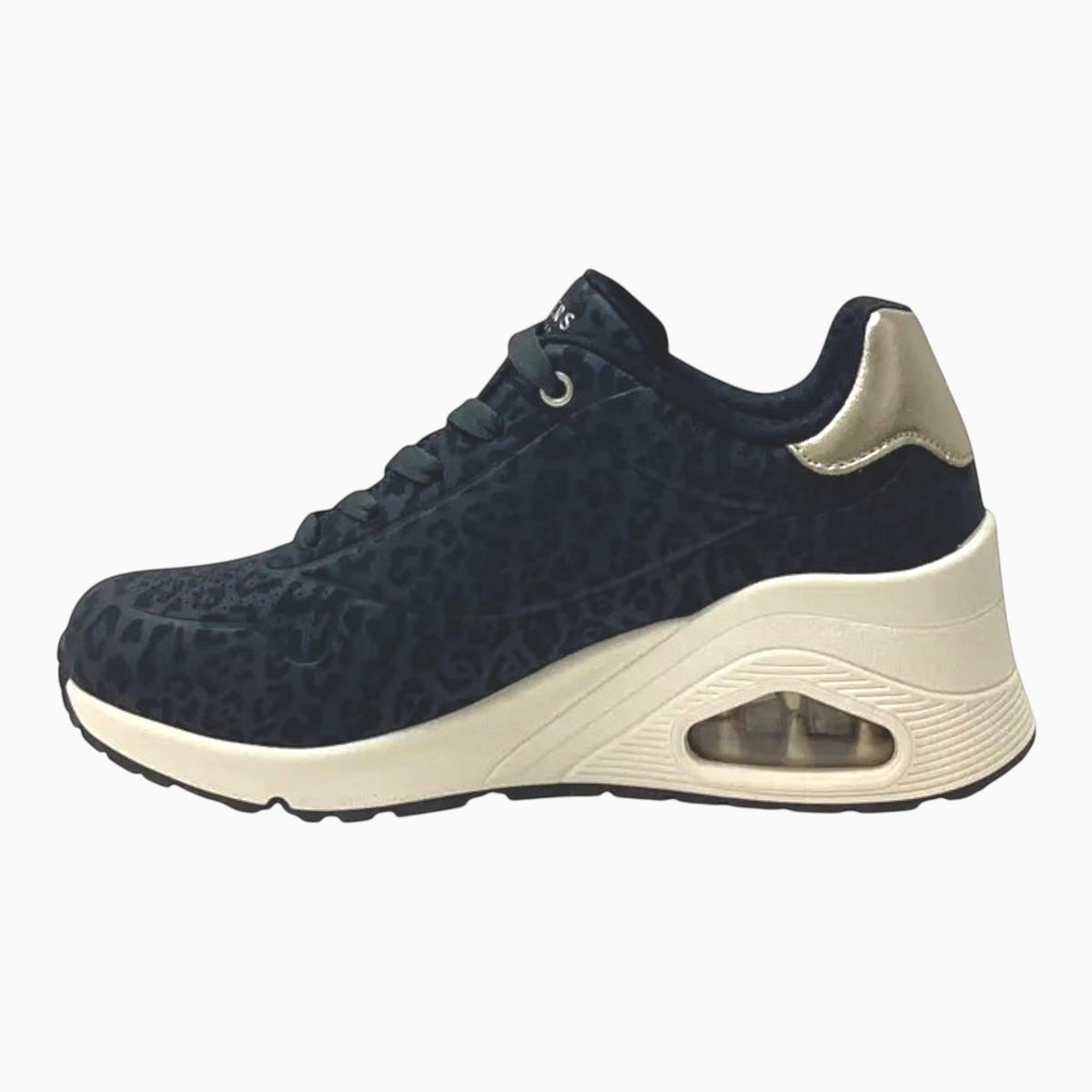 The Shoe Shop Skechers Uno Wedge sneaker in black leopard print durabuck with metallic heel and air-cushioned midsole.