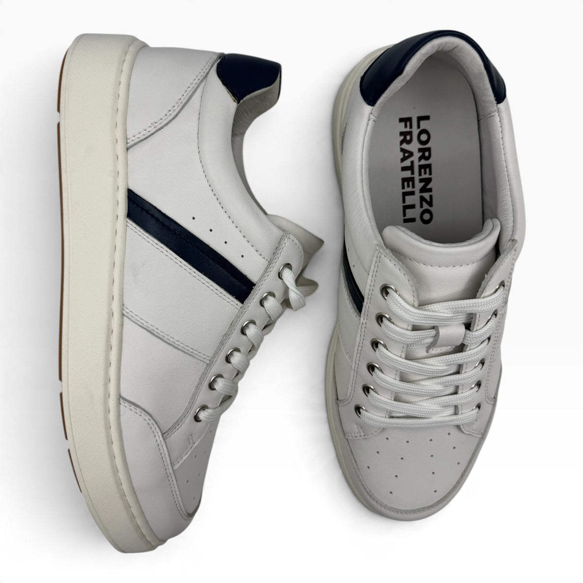 The Shoe Shop Lincoln white leather sneakers with navy blue heel and side stripe detail