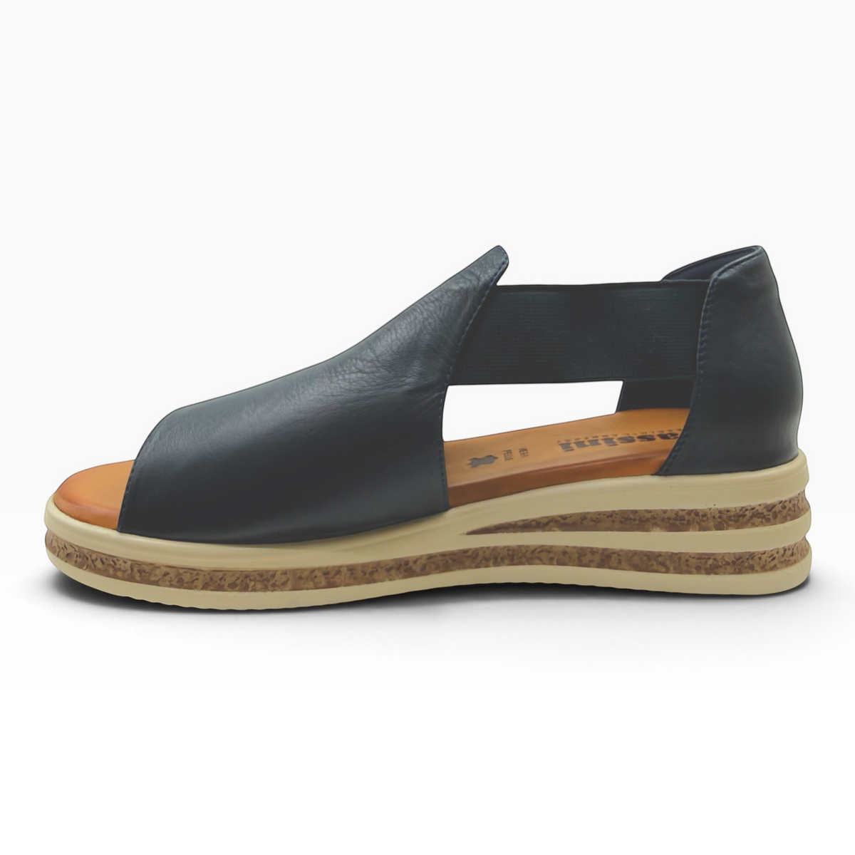 The Shoe Shop Machu black leather open-toe wedge sandal with a cork-textured platform sole and elastic side panel.