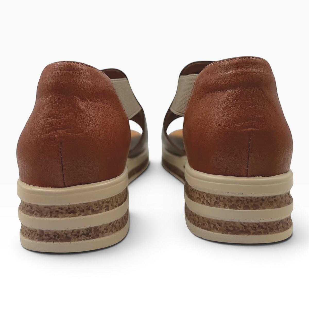 Back view of The Shoe Shop Machu brown leather platform sandals with beige textured soles