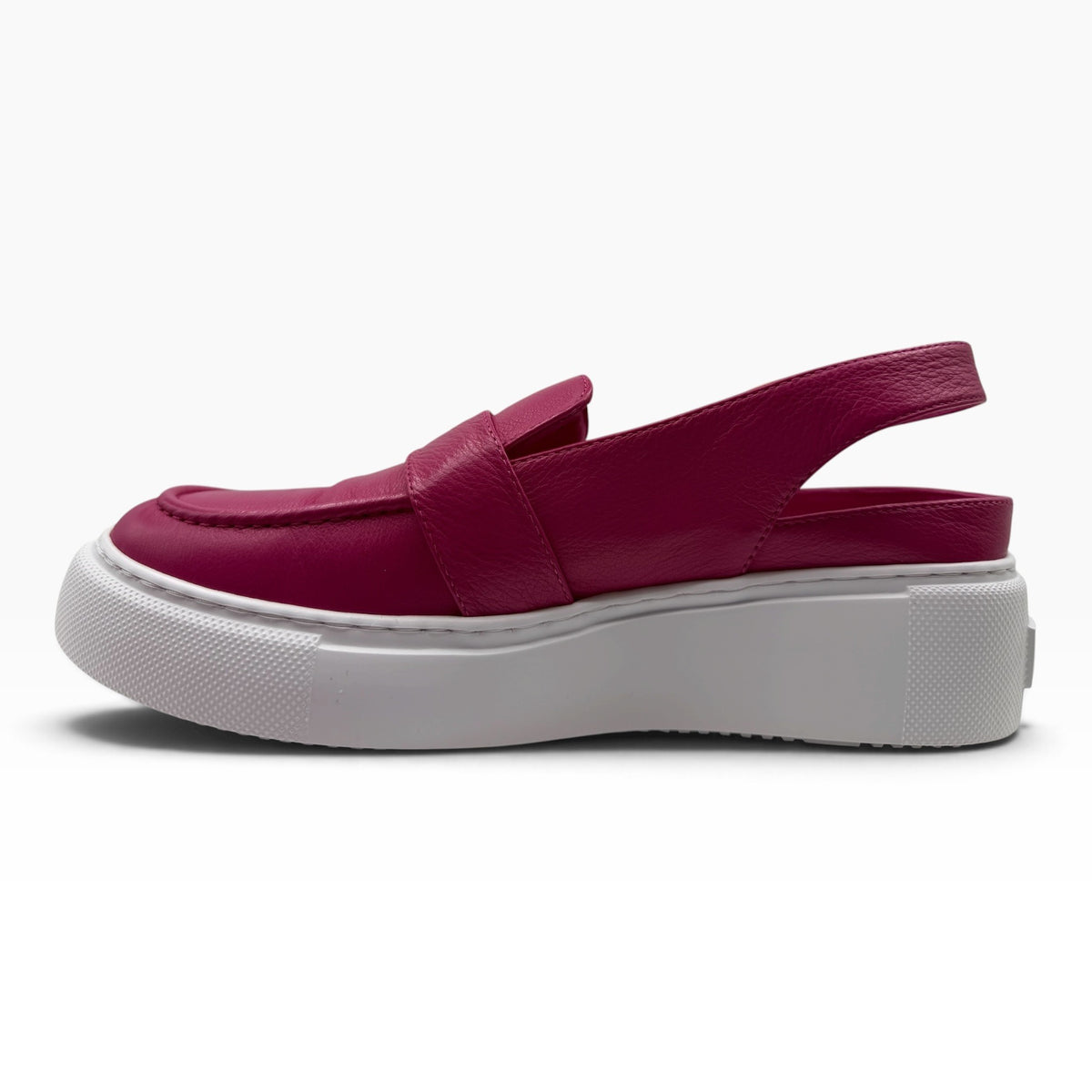 The Shoe Shop Raynell slingback loafer in magenta leather with a chunky white rubber platform sole and side view.
