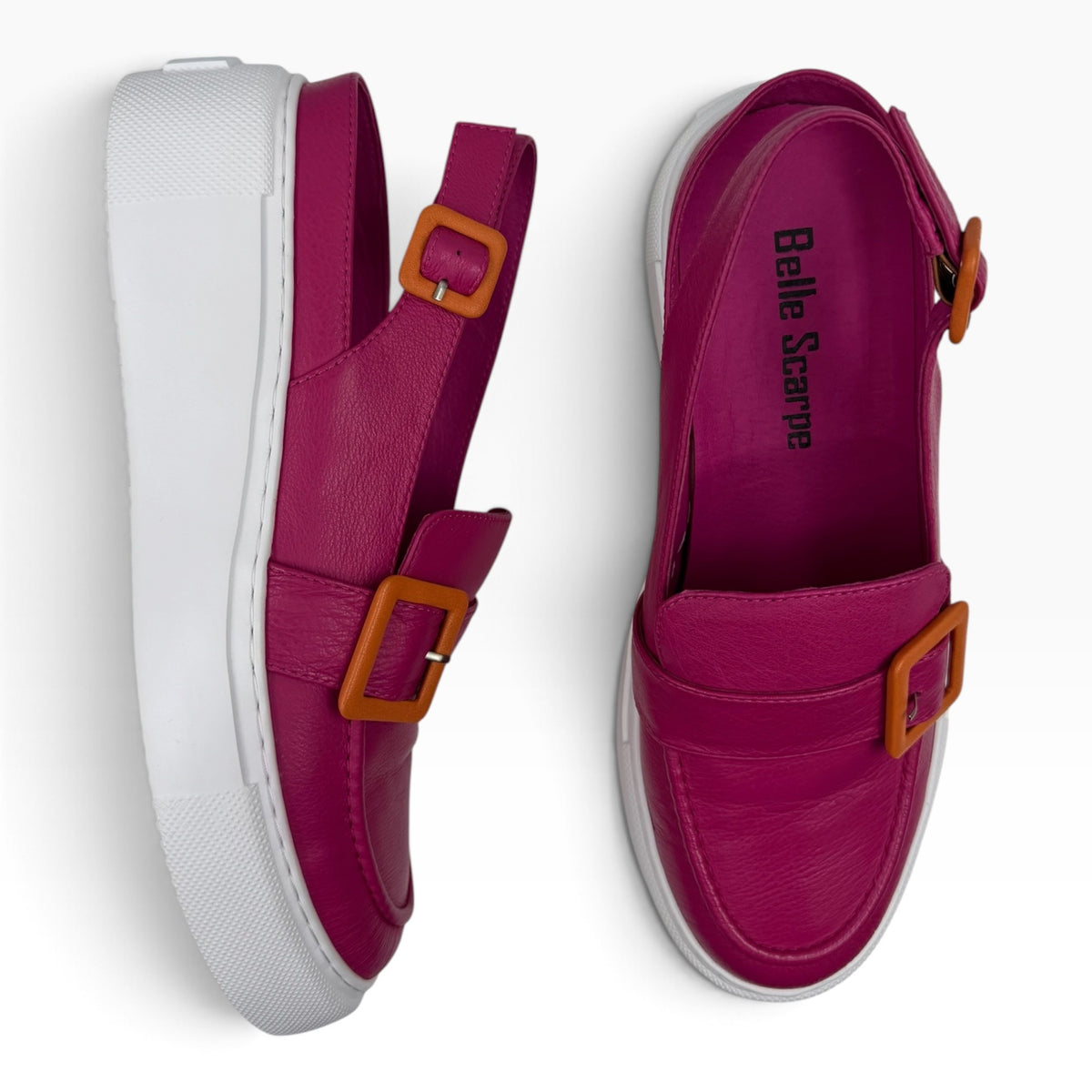 The Shoe Shop Raynell slingback loafers in magenta leather with chunky white platform soles and orange buckles.
