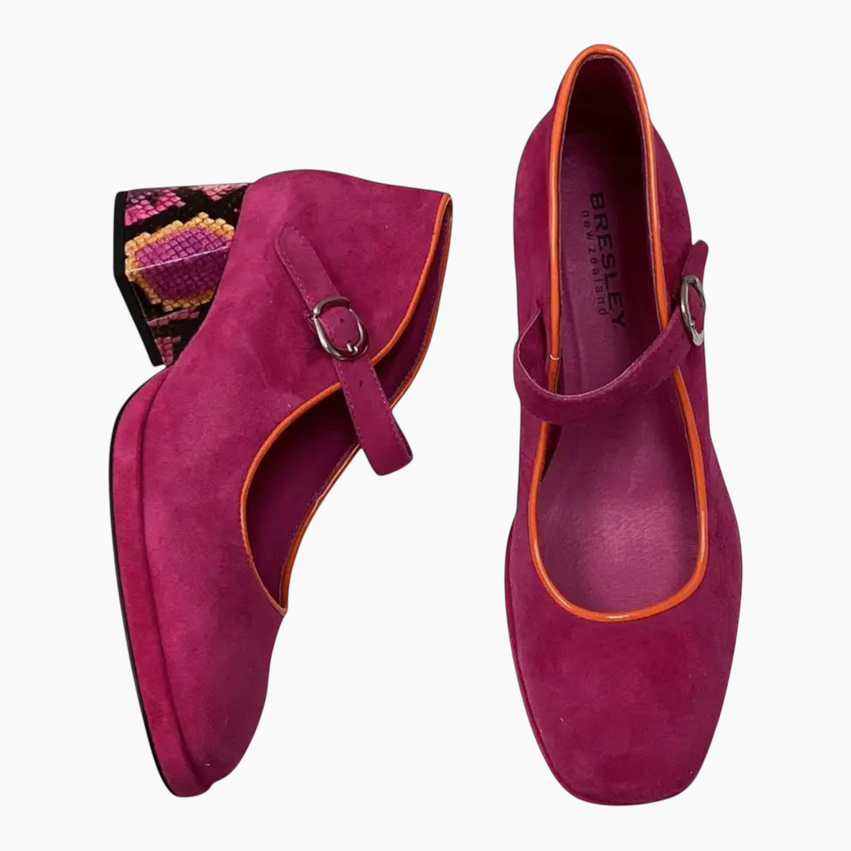 The Shoe Shop BRESLEY PODIUM magenta suede Mary Jane heels with orange trim and a patterned snakeskin block heel.