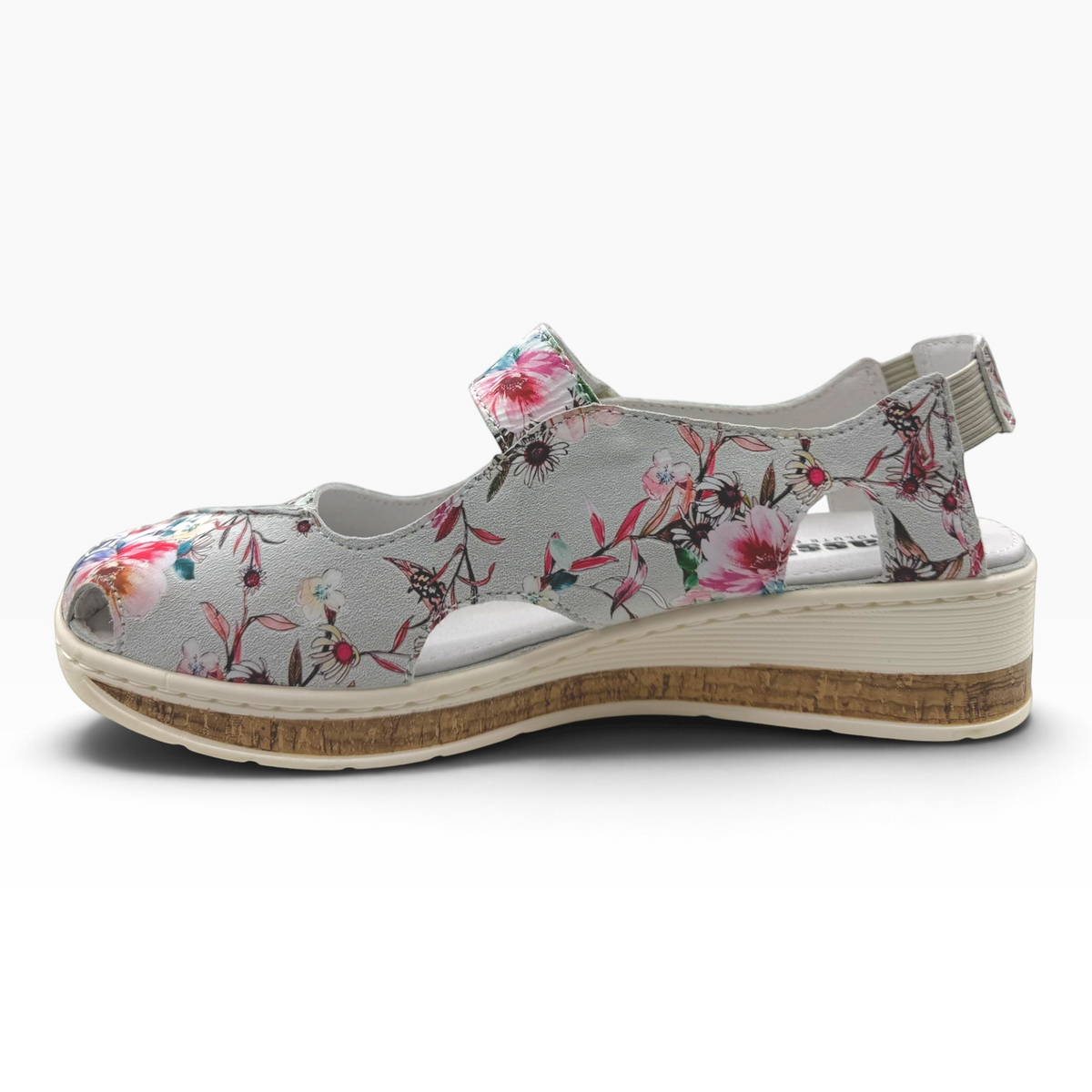 The Shoe Shop Maizy leather sandal in grey with a vibrant floral print, peep-toe, and cork-effect wedge sole.