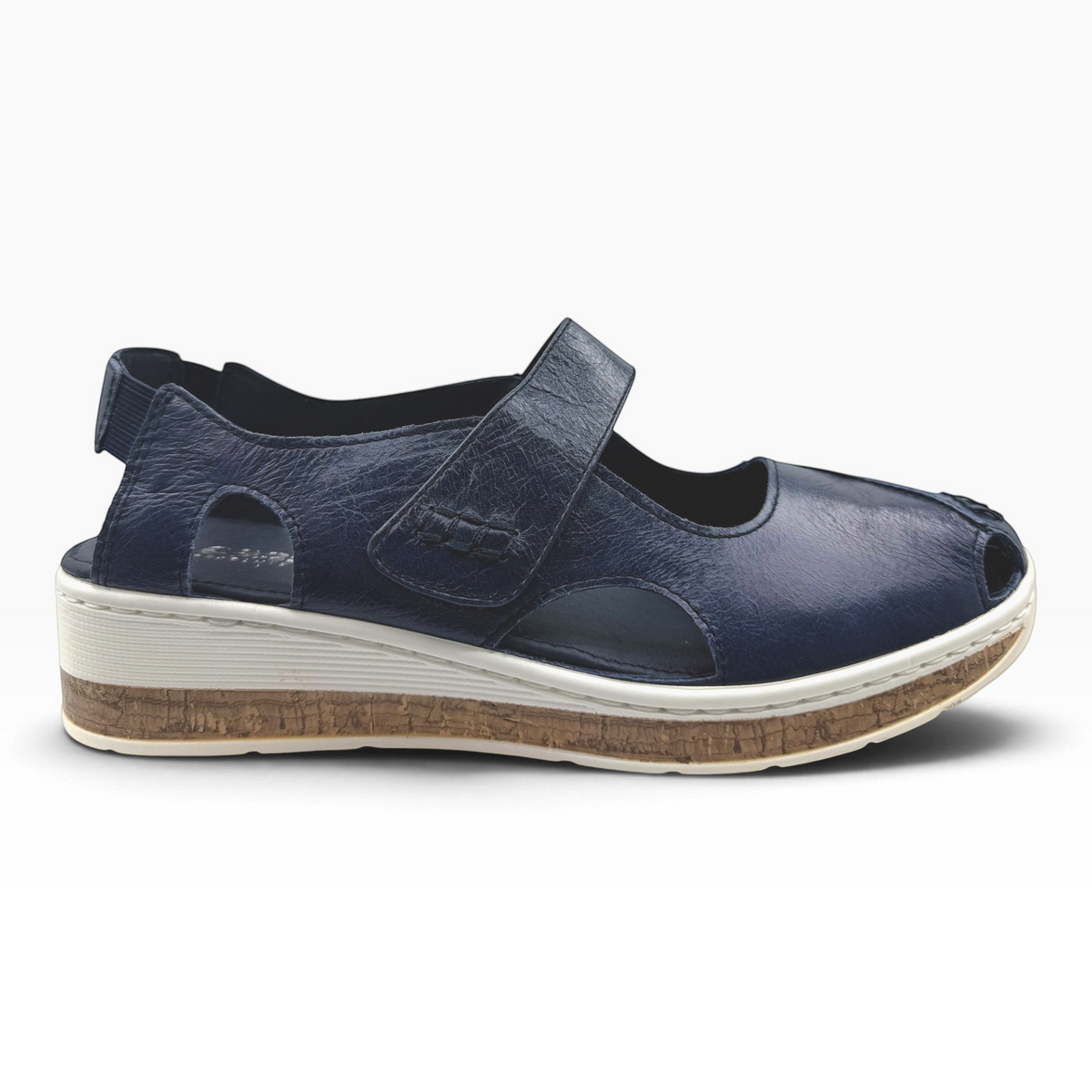 The Shoe Shop Maizy navy leather sandal with peep-toe, side cut-outs, and a comfortable cork-effect wedge sole.