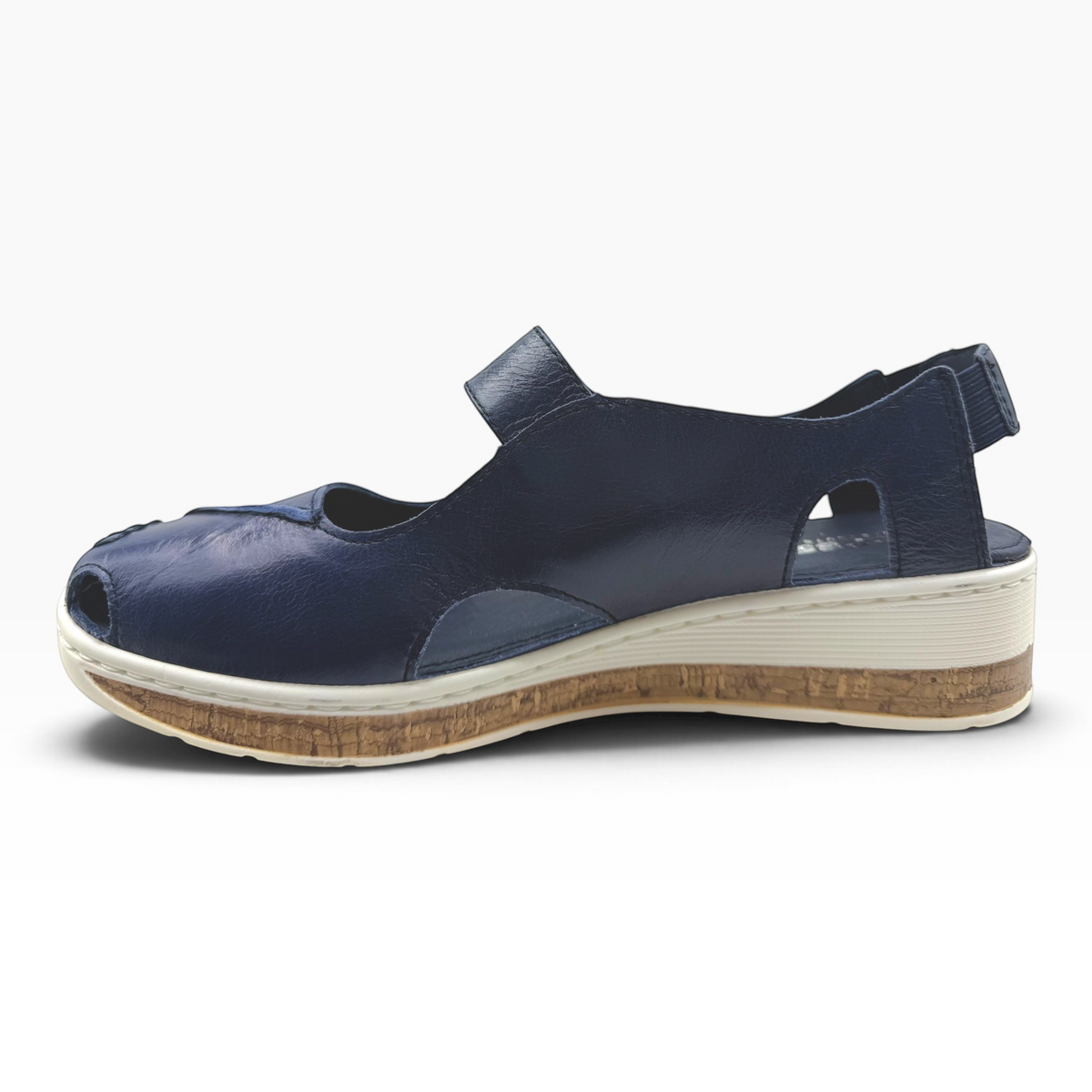 The Shoe Shop Maizy navy leather peep-toe sandal with a cushioned cork-effect wedge heel and adjustable strap.