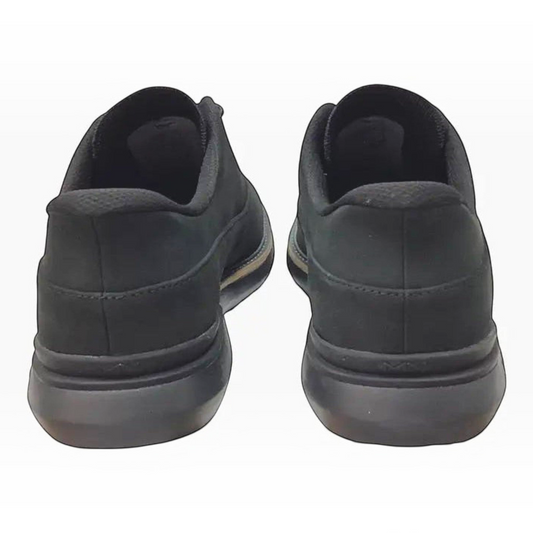 The Shoe Shop Mako Hollins black leather slip-on shoes viewed from the back showing the heel and sole detail.
