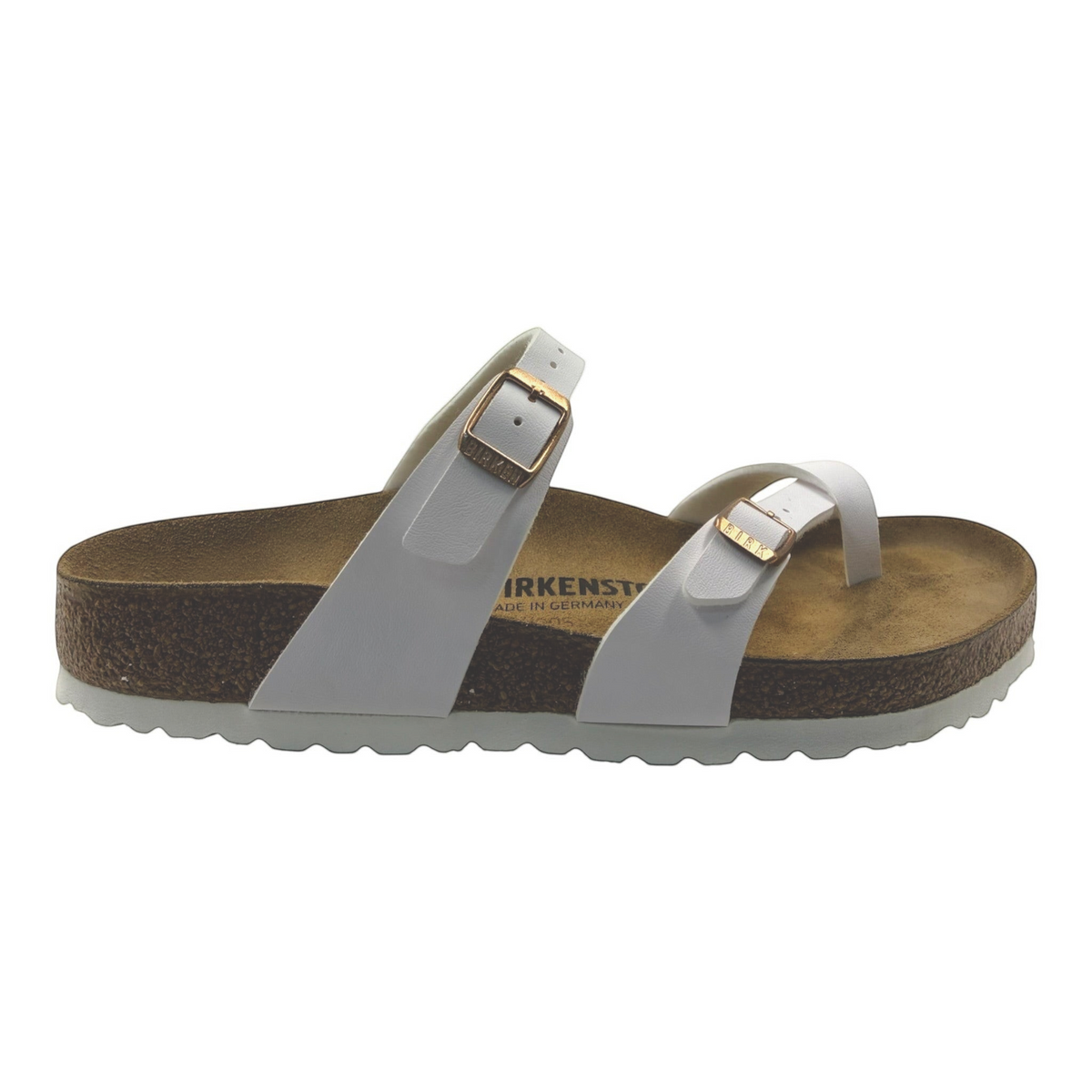 The Shoe Shop Mayari white Birko-Flor sandal with criss-cross straps, cork-latex footbed, and adjustable buckles.