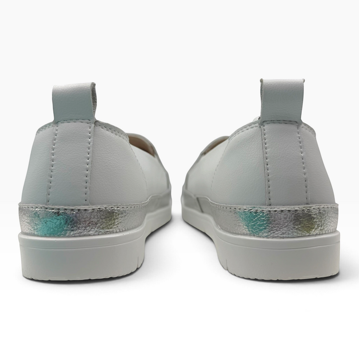 The Shoe Shop Melt slip-on shoes in white leather with a metallic silver heel detail and pull tab