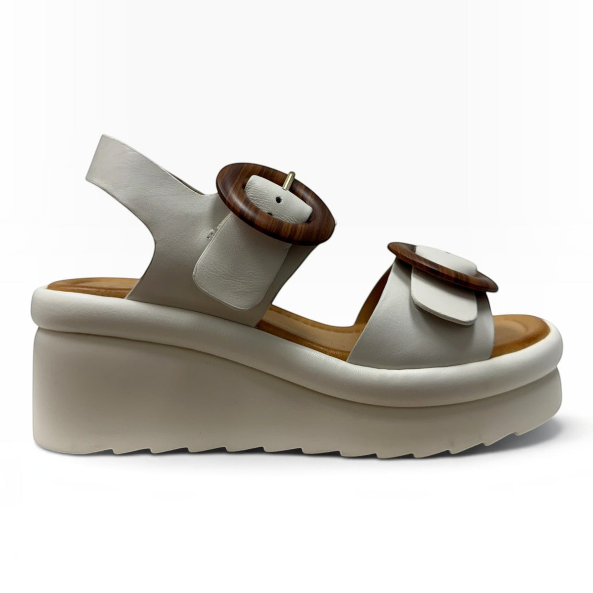 The Shoe Shop Menorcas platform sandals in off-white leather with decorative brown wooden buckles