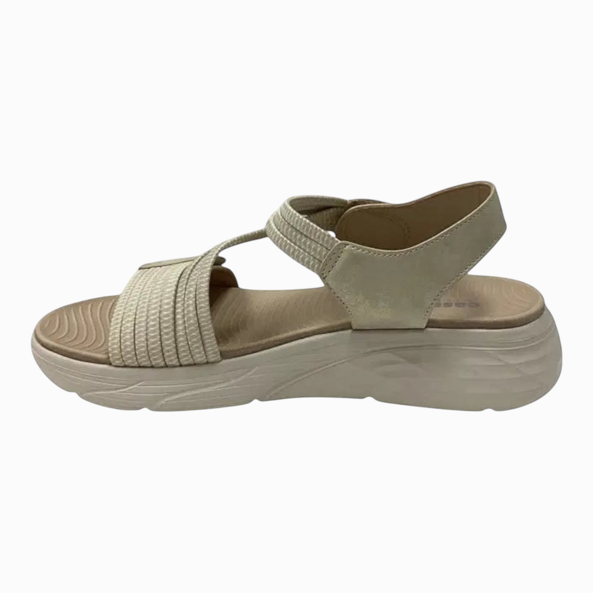 The Shoe Shop Menova beige synthetic sandals with elastic straps, velcro fasteners, and a lightweight EVA sole.