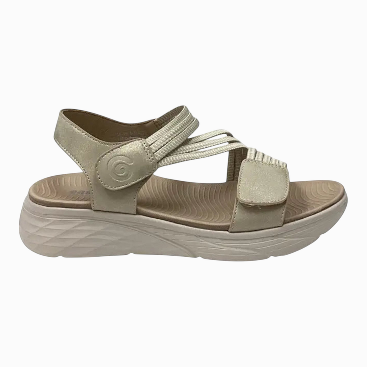 The Shoe Shop Menova beige synthetic sandal with elastic straps, Velcro fasteners, and a lightweight EVA sole.