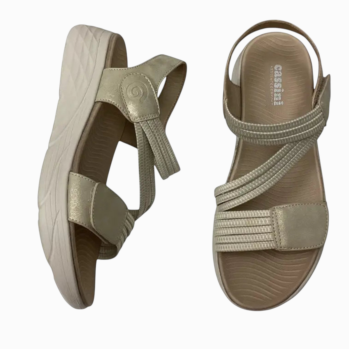 The Shoe Shop Menova champagne synthetic sandals with elastic straps, Velcro fasteners, and a lightweight EVA sole.