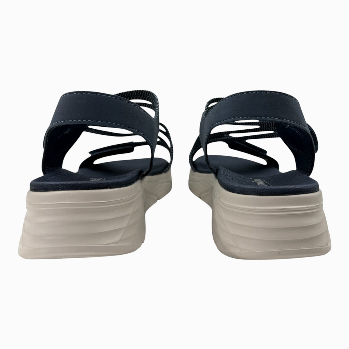 The Shoe Shop Menova navy blue sandals with elastic straps and a beige molded EVA platform sole, back view.