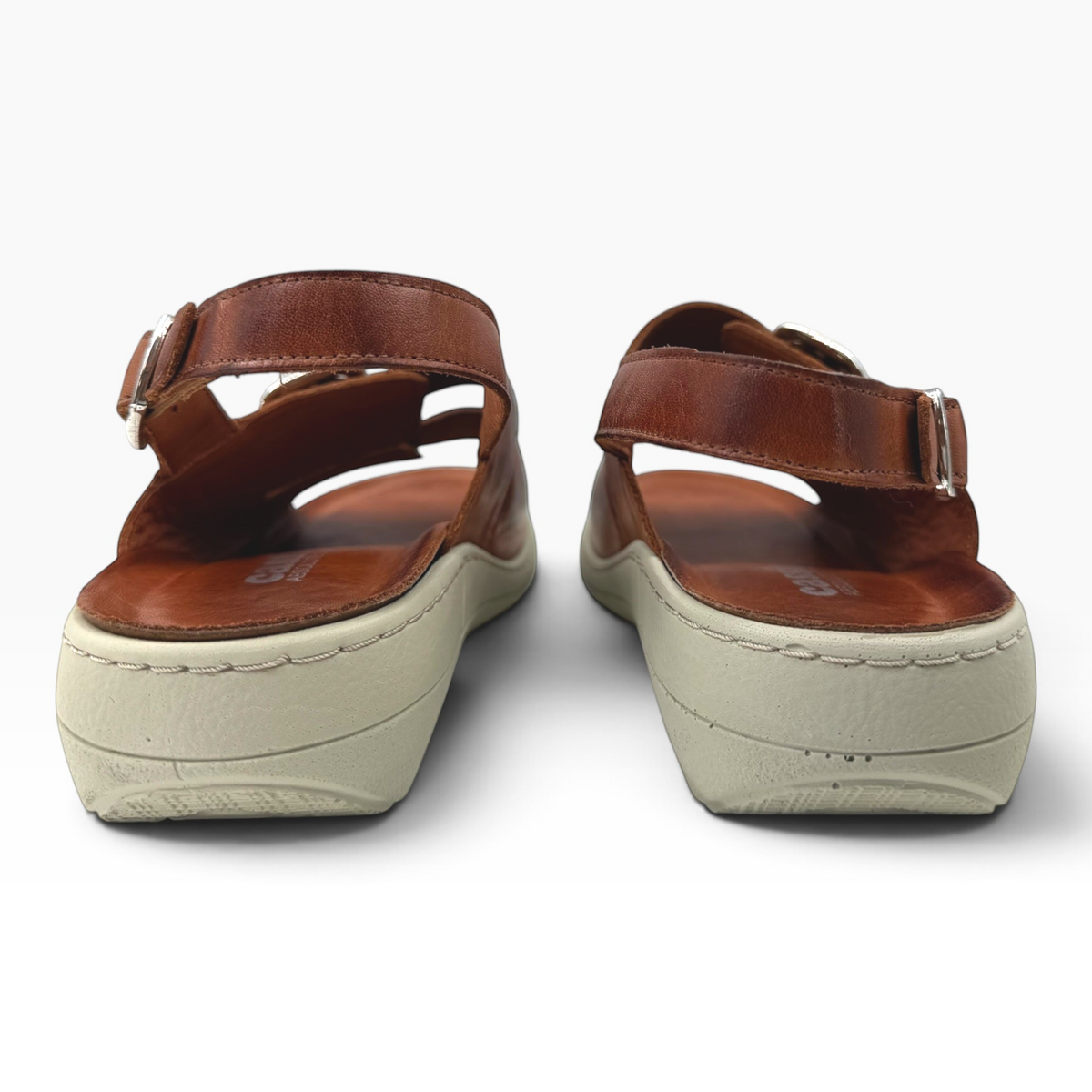 The Shoe Shop Midge brown leather sandals with adjustable ankle straps and a thick beige cushioned sole, back view.