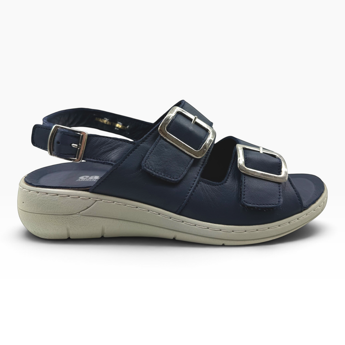 The Shoe Shop Midge navy leather sandal with adjustable silver buckles and a comfortable grey wedge sole