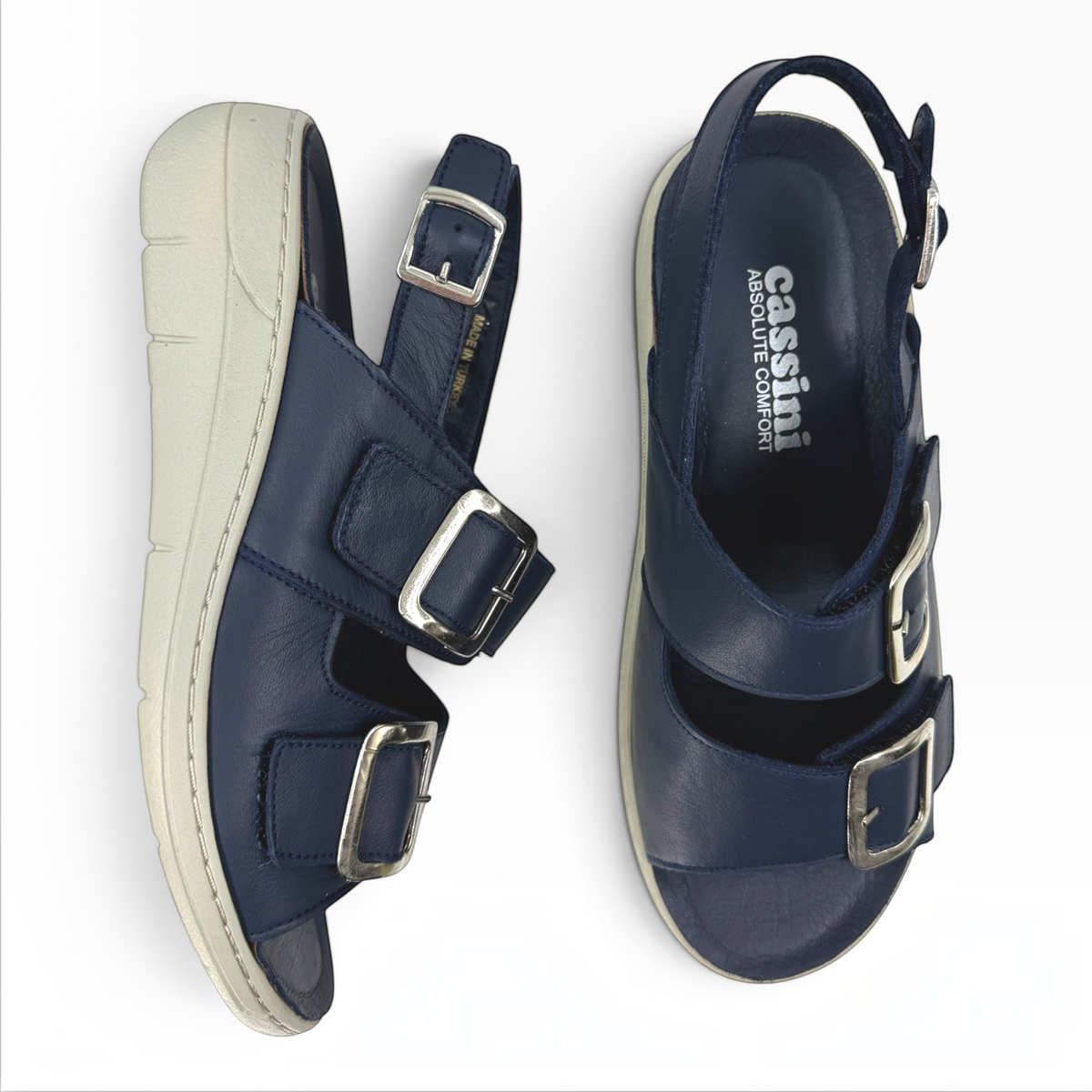 The Shoe Shop Midge navy blue leather sandals with adjustable silver buckles and a comfortable grey platform sole