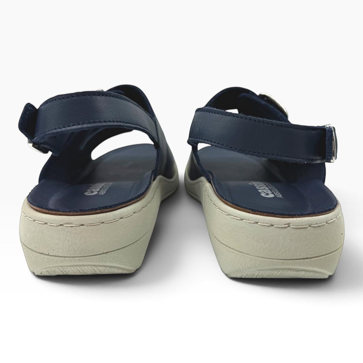 The Shoe Shop Midge navy blue leather sandals with adjustable ankle straps and supportive beige platform soles