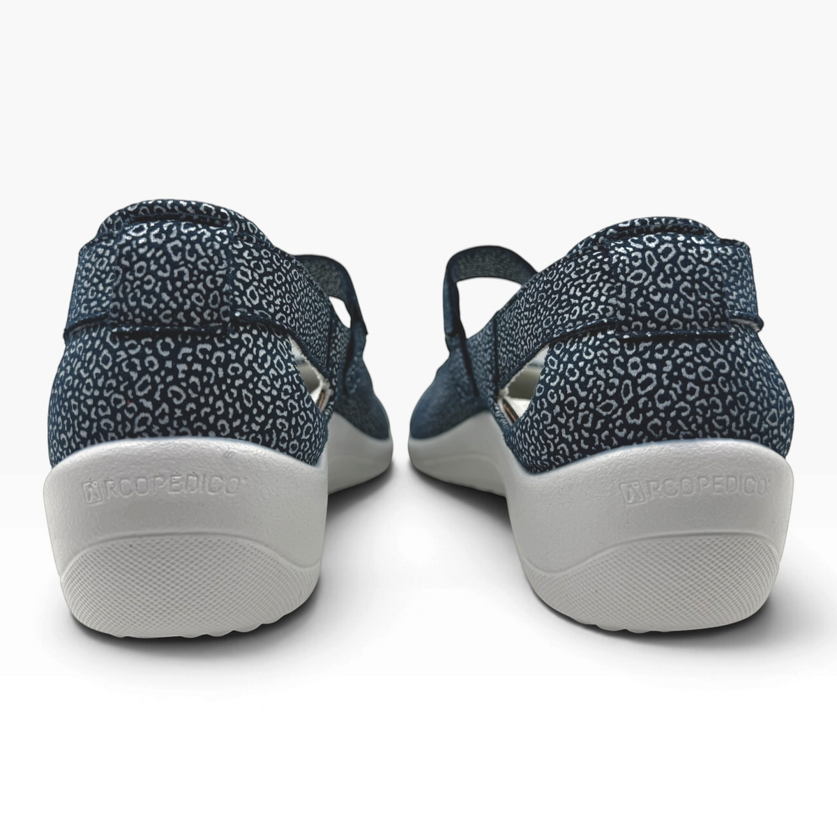 The Shoe Shop Minami navy blue patterned comfort shoes with a supportive grey sole, rear view.