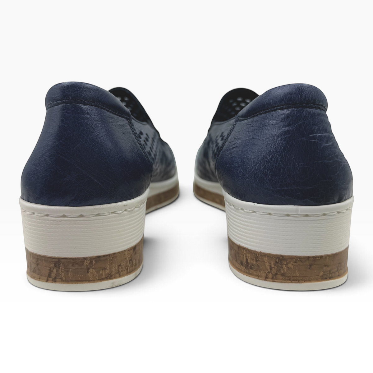 The Shoe Shop Monkey casual shoes in navy blue leather with a textured white and cork-effect low-profile sole