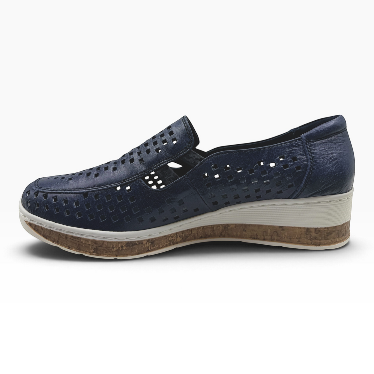The Shoe Shop Monkey casual navy blue leather slip-on shoe with laser-cut details and a cork-effect wedge sole.