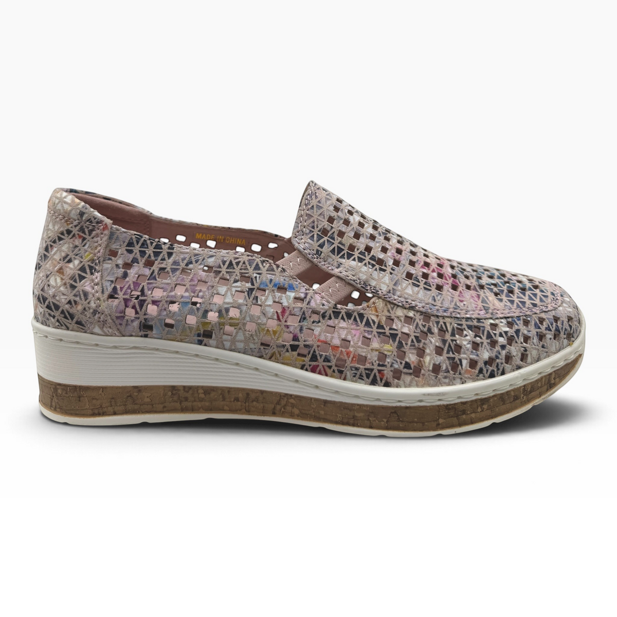 The Shoe Shop Monkey casual slip-on shoe featuring a multi-colored laser-cut patterned upper and cork-effect sole.