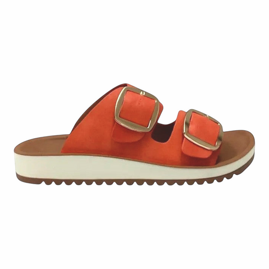 The Shoe Shop Naara orange vegan leather double-strap slide with adjustable gold buckles and a white wedge sole.