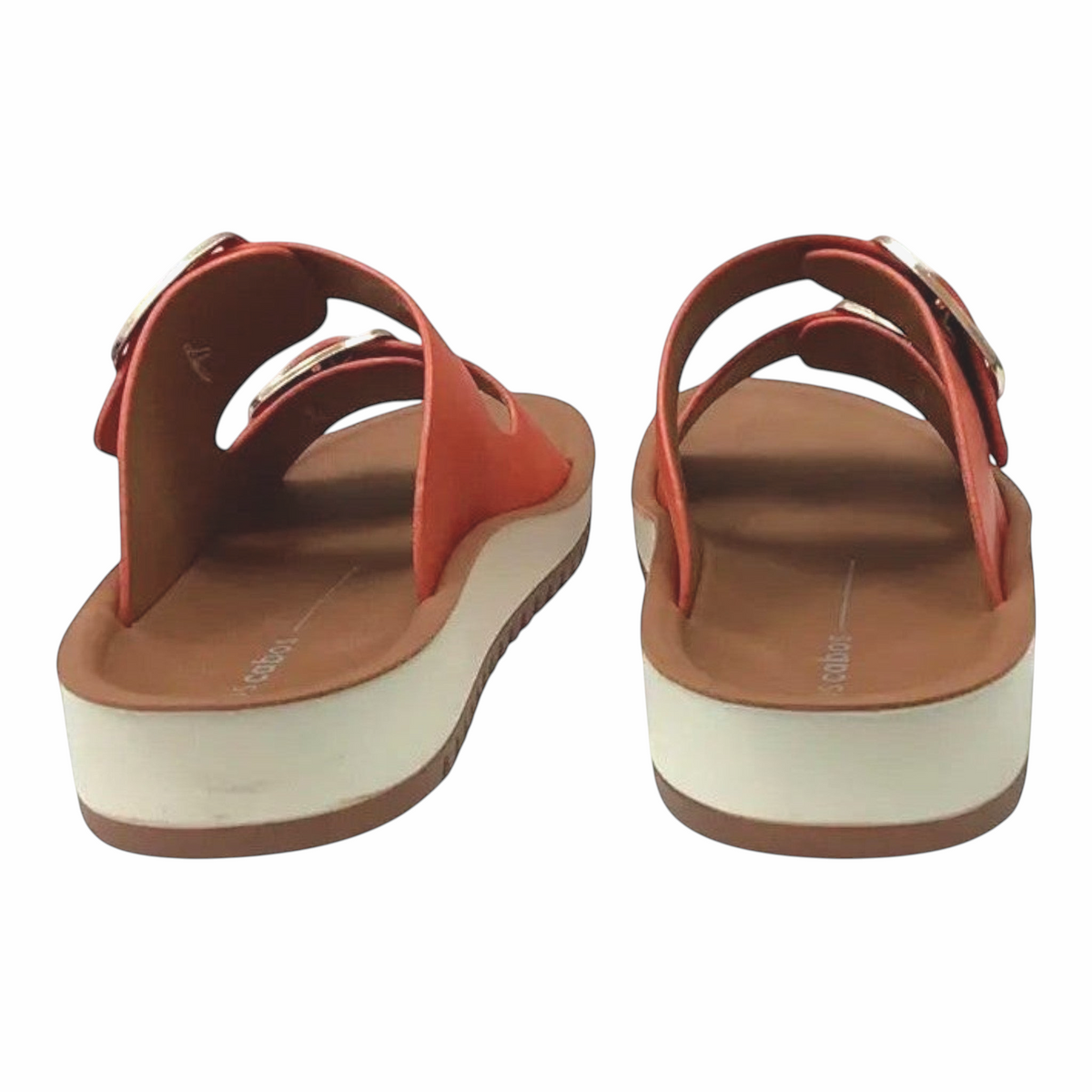 The Shoe Shop Naara vegan leather double-strap slides in burnt orange with a white low wedge heel and buckle detail