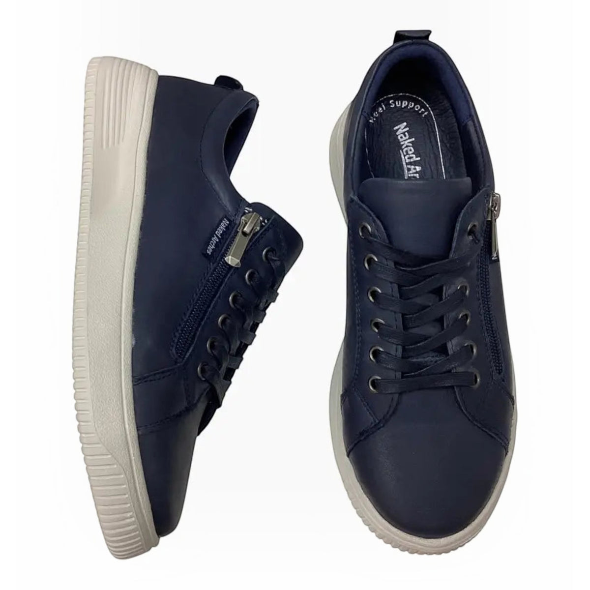 The Shoe Shop Naked Arches Nelly navy leather sneakers with platform midsole, side zip trim, and lace-up design.